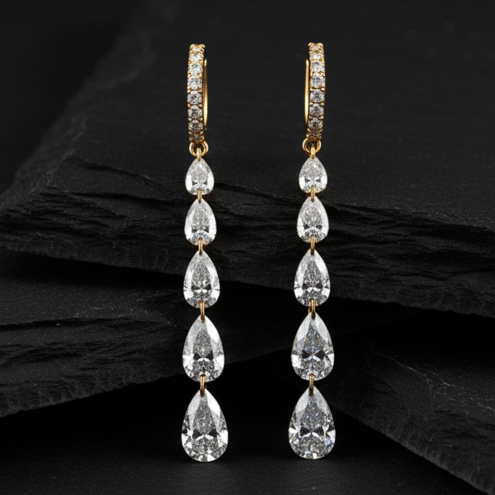 Cascading Pear Shape Drilled Diamonds Drop Earrings in 14K Gold